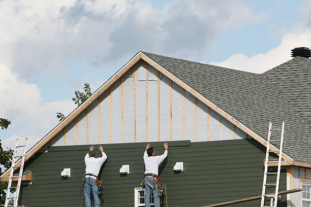 Professional Emergency Siding Repair technician working in Clarksville, OH